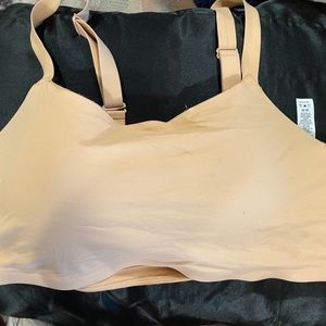 Nude gold Nike sports bra
